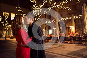 Young couple kissing on the street