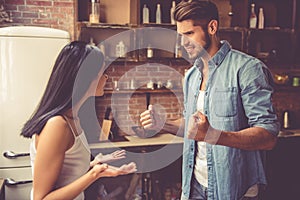 Young couple in kitchen