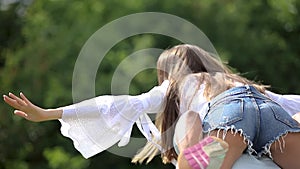 Young Couple Laughing And Having Fun Together On Nature