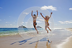 Young couple leaping for joy photo