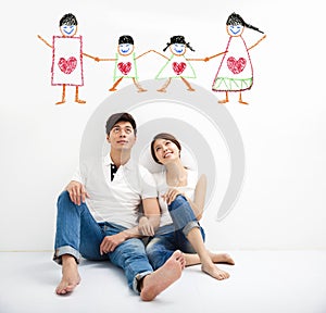 Young Couple looking the family concept draw