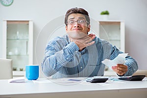 The young couple looking at family finance papers