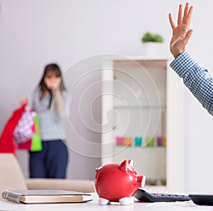 Young couple looking at family finance papers