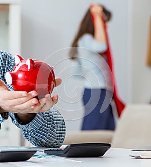 Young couple looking at family finance papers