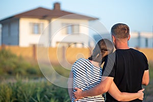 Young couple is looking at house