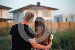 Young couple is looking at house