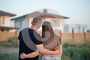 Young couple is looking at house