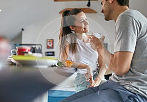 A young couple in love enjoying a lovely talk at home. Couple, home, relationship, love