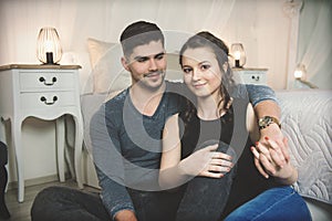 Young couple in love at home