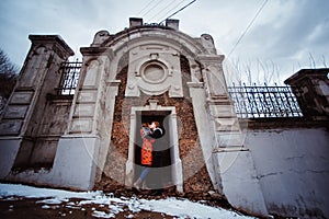 Young couple in love, hugging in the old part of town