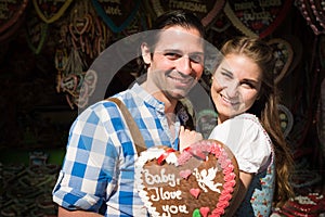 Young couple in love at Oktoberfest