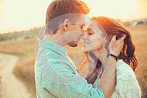 Young couple in love outdoor. Couple hugging.