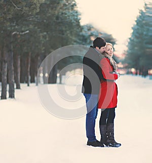 Young couple in love outdoors in the winter