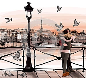 Young couple in love on Pont des arts in Paris