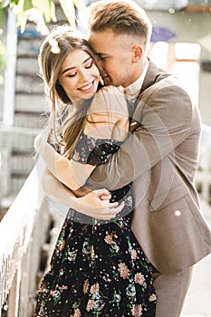 Young couple in love posing on camera