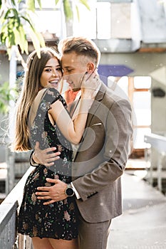 Young couple in love posing on camera