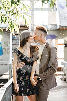 Young couple in love posing on camera