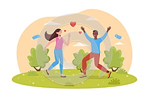 Young couple in love is running in park together