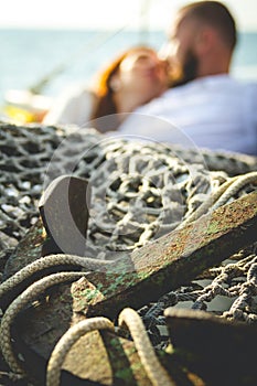 Young couple in love on sail boat