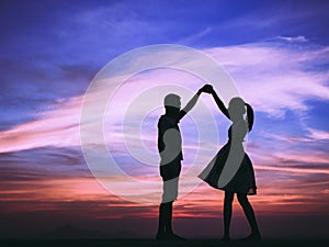 Young Couple love at sunset