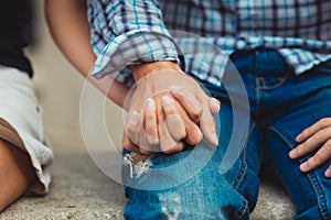 Couple in love touched hands on the first date. Man in denims. photo