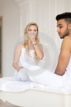 Young Couple Lying In Bed, Having Conflict Relationships Problem, Sad Negative Emotions Unhappy Hispanic Man And Woman