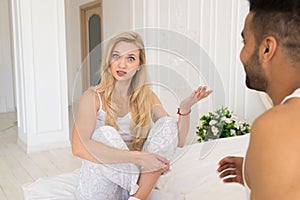 Young Couple Lying In Bed, Having Conflict Relationships Problem, Sad Negative Emotions Unhappy Hispanic Man And Woman