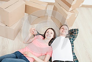 Young couple lying on the floor