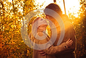 Young Couple Man and Woman Hugging and Kissing in Love