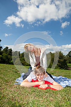 Young couple on the meadow