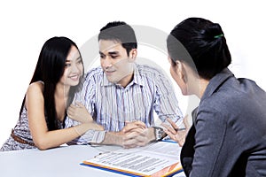 Young couple meeting financial consultant