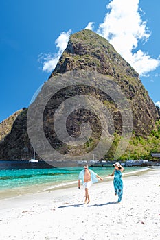 Young couple men and women vacation Saint Lucia, luxury holiday Saint Lucia Caribbean, Sugar beach