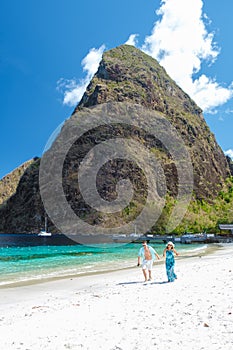 Young couple men and women vacation Saint Lucia, luxury holiday Saint Lucia Caribbean, Sugar beach