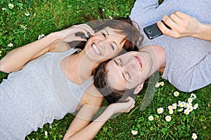 Young couple with mobile phones