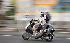 Young couple on a motorbike