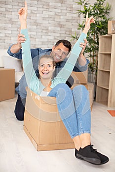 young couple move into new apartment