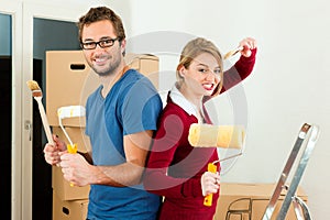 Young couple moving in new home