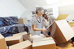 Young couple moving into their new home