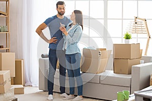 Young couple moving to a new apartment together relocation