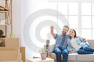 Young couple moving to a new apartment together relocation