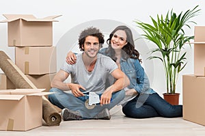Young Couple Moving To New House
