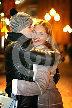 Young couple at night street photo