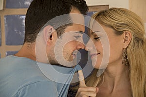 Young couple nose to nose in playful aggression