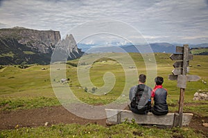 Young couple out for a hike around Seiser Alm