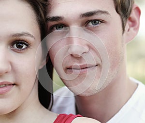 Young couple outdoors in a park