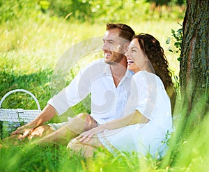 Young Couple in a Park. Picnic