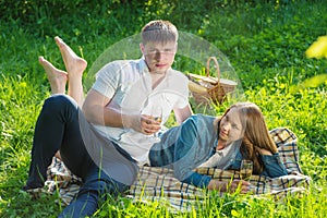 Young couple at a picnic in a city park