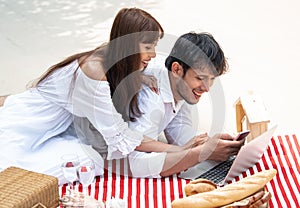 Young couple picnic in the park