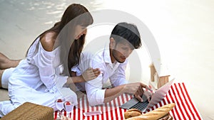 Young couple picnic in the park