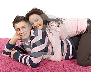 Young couple on the pink carpet